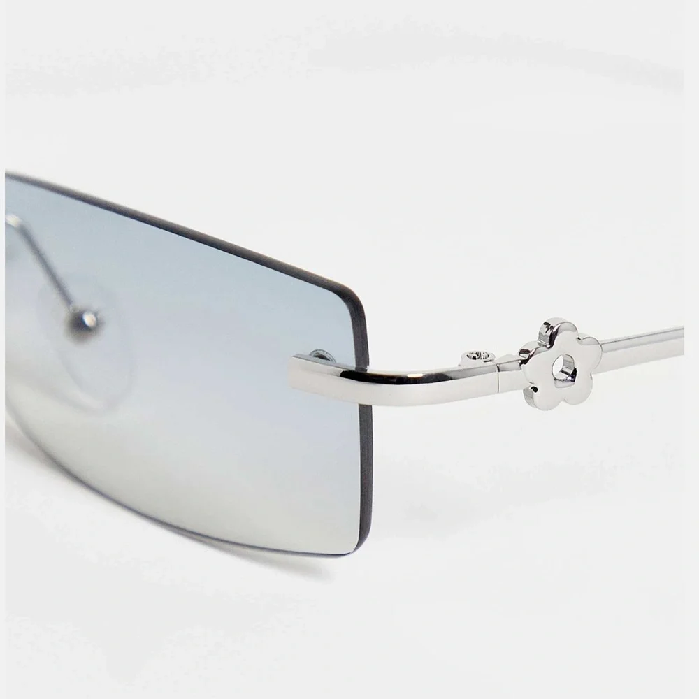 ASOS DESIGN rimless 90s sunglasses in smoke lens with 90s temple detail
